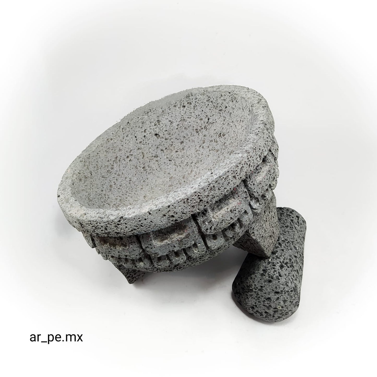Molcajete de piedra con faldejin prehispánico